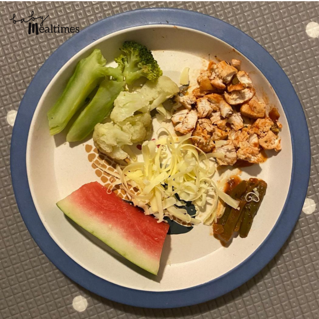 52. Chicken and Green Beans in Pasta Sauce, Broccoli and Cauliflower, Watermelon and Grated Cheese